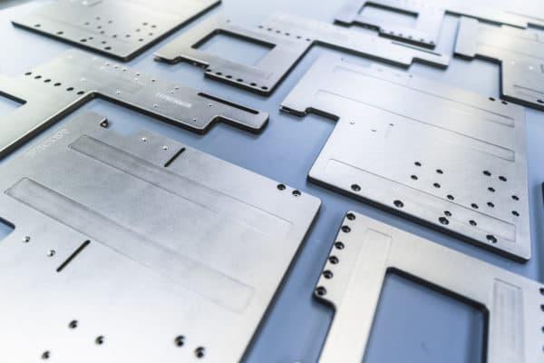 Piezas de máquinas de packaging con anodización OX-W